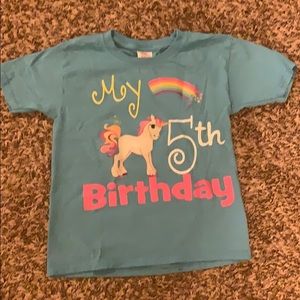Blue “My 5th Birthday” unicorn shirt.